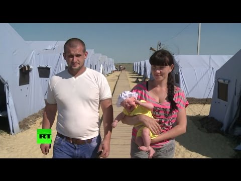 Украинским беженцам с трудом удается вырваться из зоны боевых действий