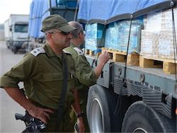 Война в Газе: через КПП Керем-Шалом непрерывно идут товары