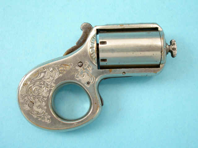 -     (James Reid Knuckle-Duster Revolver My Friend)